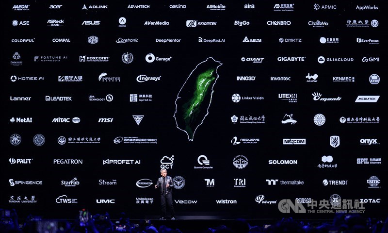 Nvidia CEO Jensen Huang shows an image of Taiwan surrounded by the names of Taiwanese companies and schools Nvidia has partnered with during his speech in Taipei on Sunday. CNA photo June 3, 2024