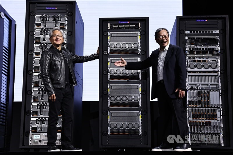 Supermicro founder and CEO Charles Liang (right) is joined by Nvidia CEO Jensen Huang when give a keynote speech at the Computex trade show in Taipei Wednesday. CNA photo June 5, 2024