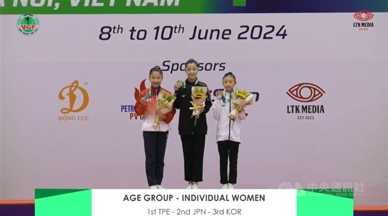 Wang Fei-chu (center) holds her gold medal at this year's Aerobic Gymnastics Asian Championship taking place in Hanoi, Vietnam. Photo courtesy of Chinese Taipei Gymnastics Promotion Association June 11, 2024