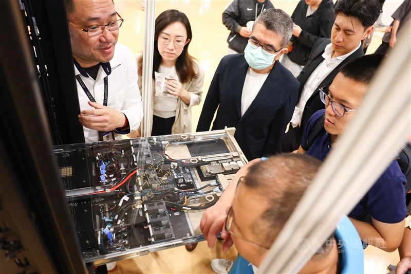 Hon Hai shareholders listen to an introduction of an AI server displayed at the company in New Taipei on May 31, 2024. Photo: CNA