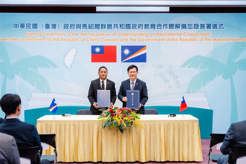 Taiwan Foreign Minister Lin Chia-lung (right) and Marshallese Minister of Education, Sports and Training Joe Bejang pose for a photo at the MOU signing ceremony Wednesday. Photo courtesy of MOFA July 3, 2024