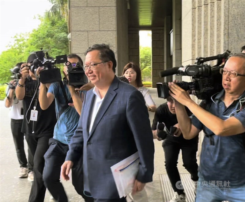 Cheng Wen-tsan (front center), former vice premier and current chairman of the Straits Exchange Foundation, leaves the Taoyuan District Court on Saturday. CNA photo July 6, 2024