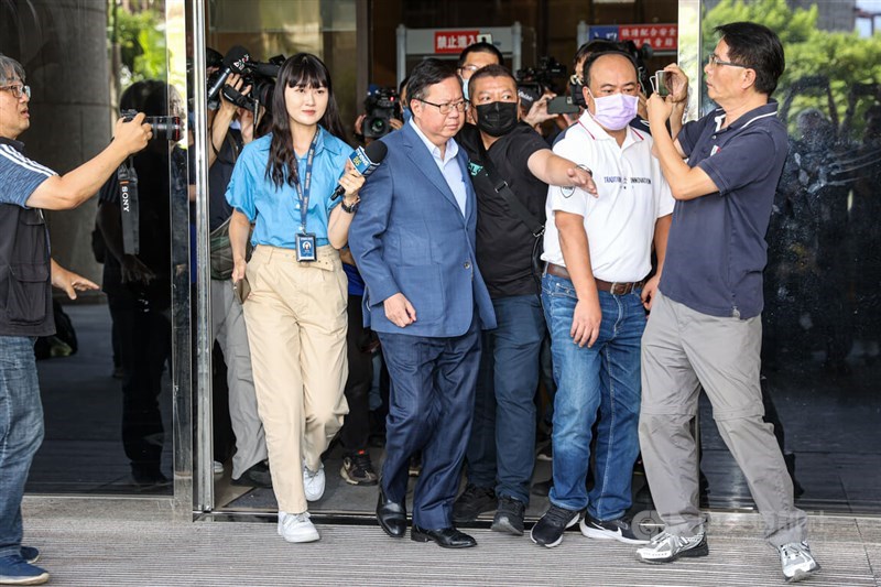 Former Vice Premier Cheng Wen-tsan (fourth right) steps out of the Taoyuan District Court, which rejected prosecutors' detention request and granted a release on bail on Tuesday. CNA photo July 9, 2024