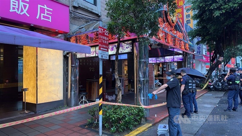 Policemen examine the area around the sauna, which has been cordoned off following Wednesday's shooting. Photo courtesy of local authorities July 10, 2024