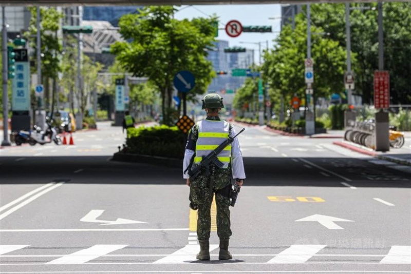 A military policeman stands on a road near Nangang Station in Taipei during the Wanan Exercises in 2023. CNA file photo