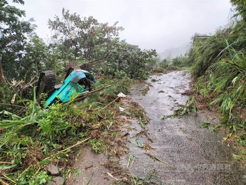 The overturned excavator is pictured in New Taipei Wednesday after the driver, a ward chief, was injured and sent to the hospital, where he was later pronounced dead. Photo courtesy of local authorities July 24, 2024