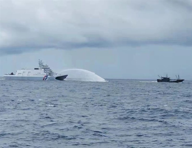 A Taiwanese Coast Guard vessel fires water cannon to stop the fleeing Chinese fishing boat. Photo courtesy of Taiwanese fishing boat skipper July 31, 2024