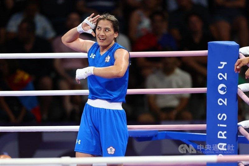 Taiwanese boxer Chen Nien-chin listens to cheers after her victory against No. 3 seed Barbara Maria dos Santos of Brazil in the women's 66-kilogram round of 16 match at the Paris Olympics on Thursday. CNA photo Aug. 1, 2024