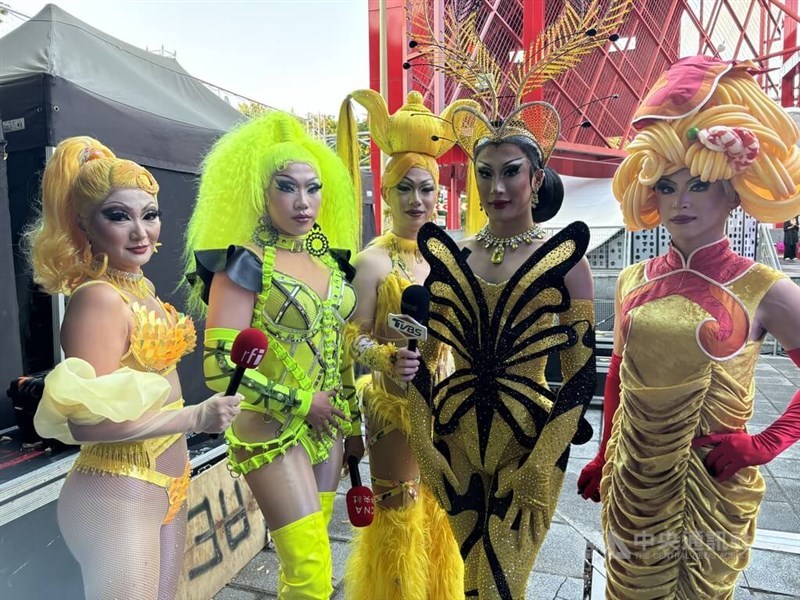 Taiwan's "Drag Queen" Nymphia Wind (second right) and members of her Haus of Wind performance troupe speak to Taiwan press in Paris on Friday. CNA photo Aug. 9, 2024