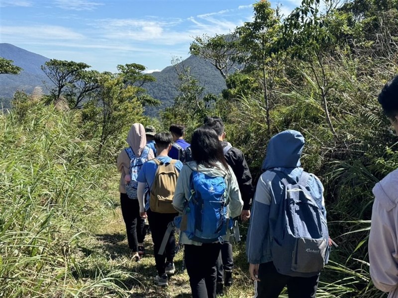 The group's students hike a section of the Jinshuiying Old Trail in Taitung County on Thursday. Photo courtesy of Chung Chia-pin's office Aug. 22, 2024