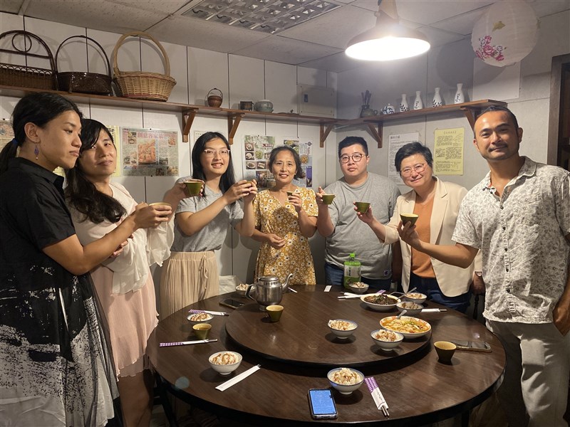 Transgender woman identified by her surname Wu (third left) toasts with her family and members of the Taiwan Alliance to Promote Civil Partnership Rights in celebration on Monday. Photo courtesy of Taiwan Alliance to Promote Civil Partnership Rights Aug. 26, 2024