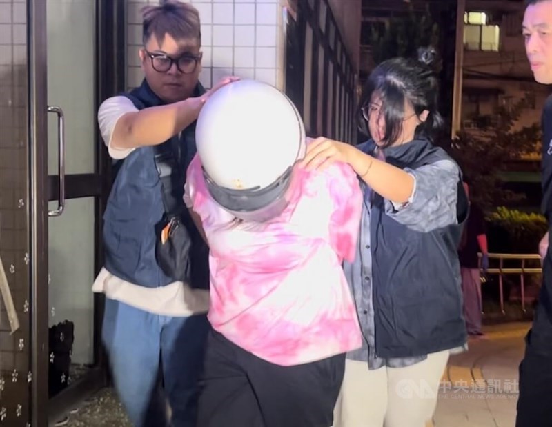 A woman is arrested in New Taipei's Tucheng Township on Monday night. Courtesy of local authorities Oct. 1, 2024