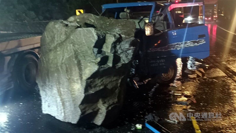 A smashed truck is seen on the South Link Highway after crashing into a boulder in Taitung County on Monday. CNA photo Oct. 2, 2024