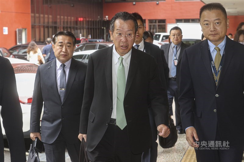 Minister of National Defense Wellington Koo (center) arrives at the Legislature in Taipei Friday morning. CNA photo Oct. 4, 2024