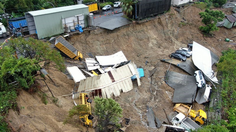 A landslide takes place at the site of the Tianwaitian waste recycling incineration plant in Keelung Thursday night. CNA photo Oct. 4, 2024