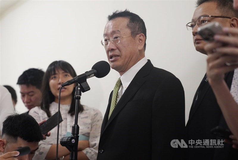 Defense Minister Wellington Koo (second right) talks to the press at the Legislature in Taipei Thursday. CNA photo Oct. 17, 2024