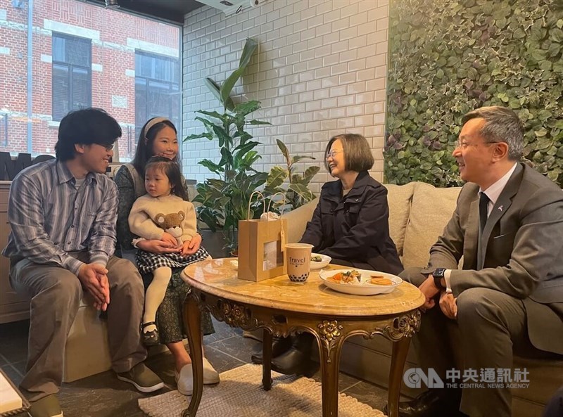 Former President Tsai Ing-wen (second right) visits a restaurant run by a Taiwanese expat couple (left and second left) in Leuven, Belgium, on Friday. CNA photo Oct. 18, 2024