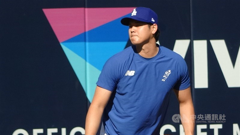 Los Angeles Dodgers slugger Shohei Ohtani warms up at the Dodgers Stadium ahead of the World Series Game 1 Friday. CNA photo Oct. 26, 2024