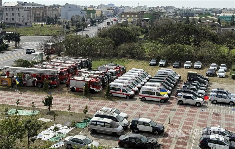 Refurbished disaster relief vehicles including fire trucks and ambulances are parked at a lot destined for Ukraine on Saturday. CNA photo Nov. 9, 2024