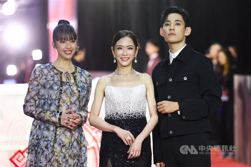 Pink Yang (center) poses for a photo with her co-hosts on the red carpet for the 61st Golden Horse Awards ceremony on Saturday. CNA photo Nov. 23, 2024