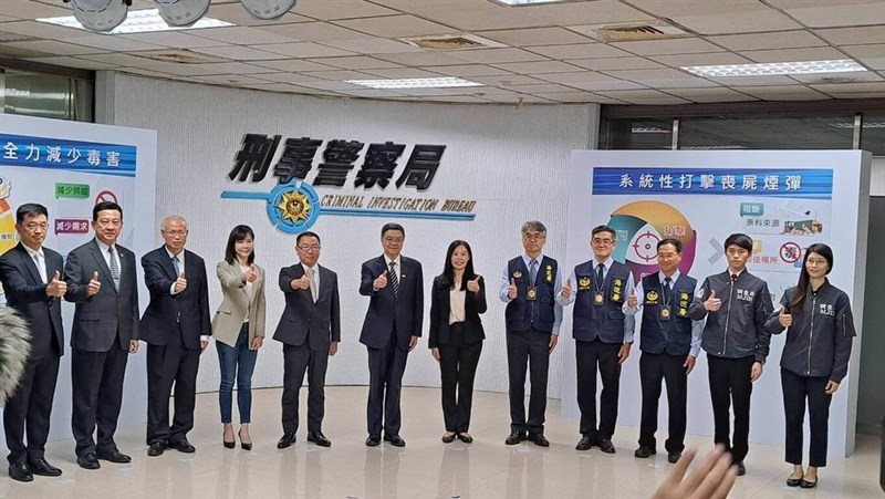 Premier Cho Jung-tai (卓榮泰, sixth left) attends a news conference organized by the National Police Agency on Wednesday. CNA photo Nov. 27, 2024