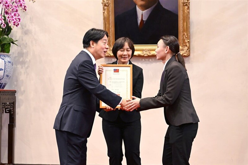 President Lai Ching-te (left) shake hands with Tokyo Olympic Silver medalist badminton player Tai Tzu-ying (right) when she during a ceremony she was formally appointed as a new ambassador-at-large of the Republic of China (Taiwan) at the Presidential Office in Taipei on Oct. 7, 2024. File photo courtesy of Presidential Office