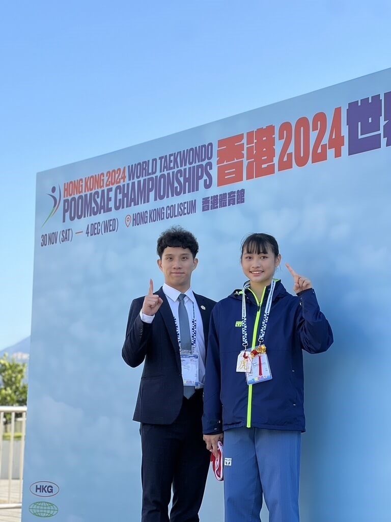 Taiwanese taekwondo practitioner Lin Yu-hsuan (right) and Poomsae coach Li Cheng-gang pose for a photo together in Hong Kong. Photo courtesy of Li Cheng-gang Nov. 30, 2024