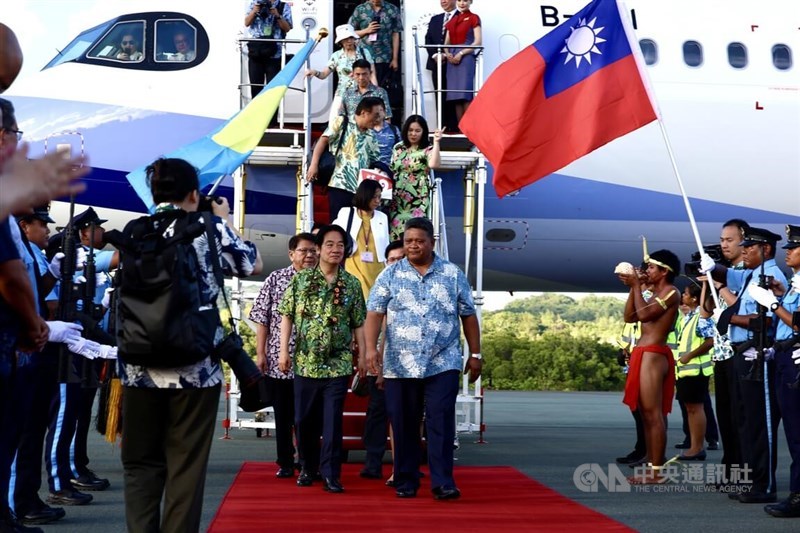 President Lai Ching-te is accompanied by Minister of State for the Republic of Palau Gustav N. Aitaro upon the former's arrival to Palau. CNA photo Dec. 5, 2024