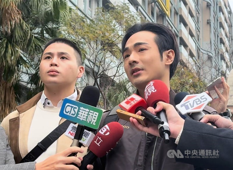 Anti-CCP YouTuber, Pa Chiung (right) and Taiwanese rapper Chen Po-yuan (left) speak to local press after making a viral splash on Youtube with their documentary. CNA photo Dec. 8, 2024