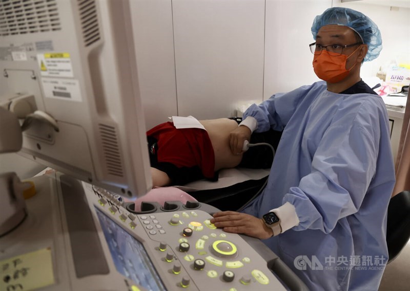 A patient receives an ultrasound from his physician in this CNA file photo.