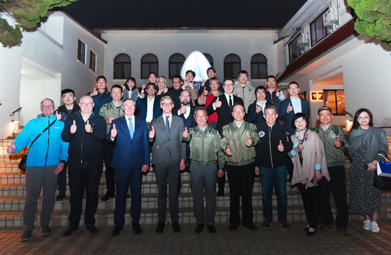 Members of a visiting delegation from Estonia pose with local officials and executives for a group picture during a visit to the AIDC on Friday. Photo courtesy of the AIDC