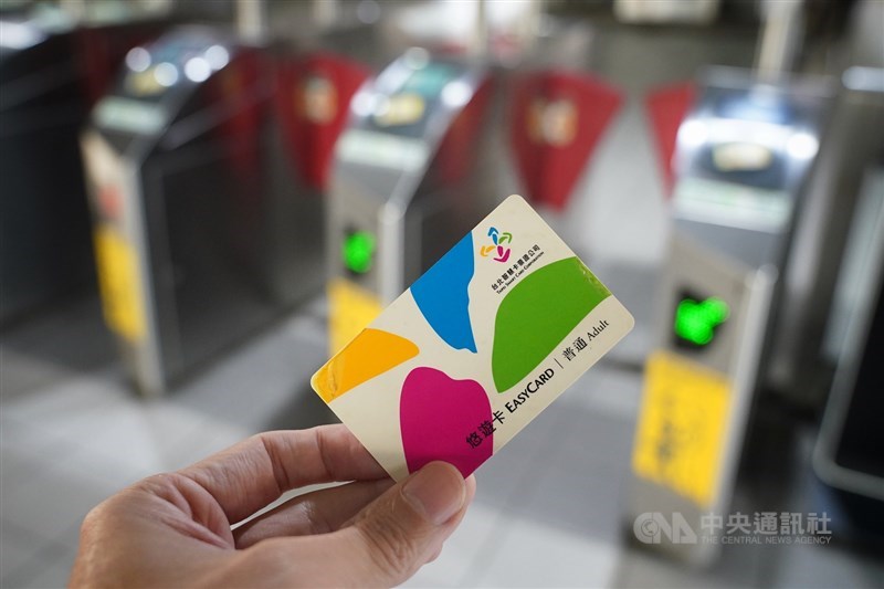 A passenger pulls out an EasyCard to enter a MRT station on Monday. CNA photo Feb. 17, 2025