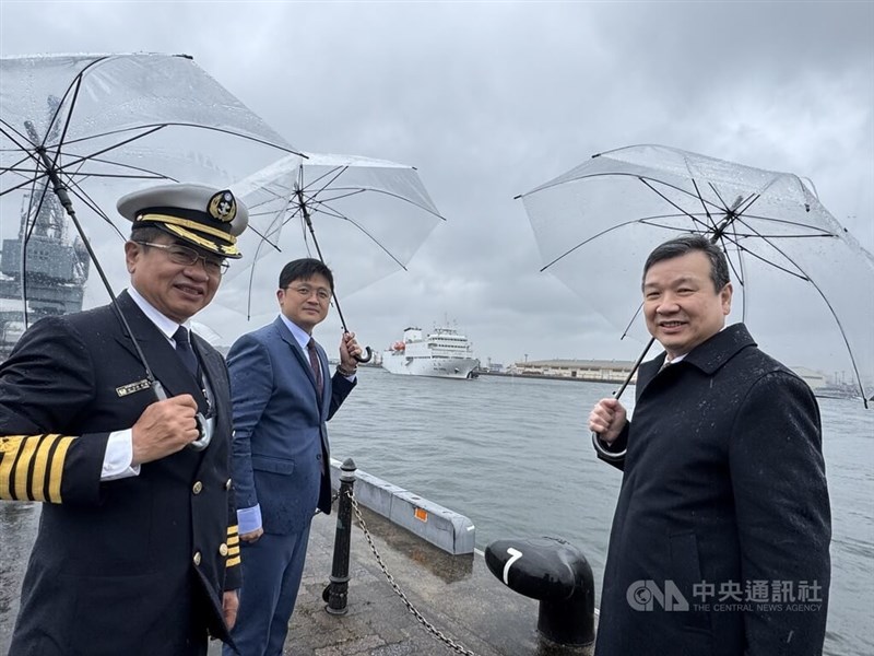 Taiwan's representative to Japan Lee Yi-yang (李逸洋, right) accompanied by Ministry of Education Secretary General Lin Po-chiao (林柏樵, second left) and National Kaohsiung University of Science and Technology President Yang Ching-yu (楊慶煜, left) at Tokyo Harbor to welcome the MOE's Wind Rider. CNA photo March 3, 2025