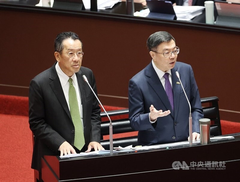 Defense Minister Wellington Koo (left) stands beside Premier Cho Jung-tai during a hearing at the legislature in Taipei on Tuesday. CNA photo March 11, 2025