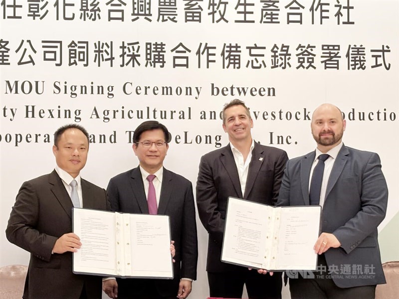 Foreign Minister Lin Chia-lung (second left) and American Institute in Taiwan official Erich Kuss (second right). CNA photo March 20, 2025