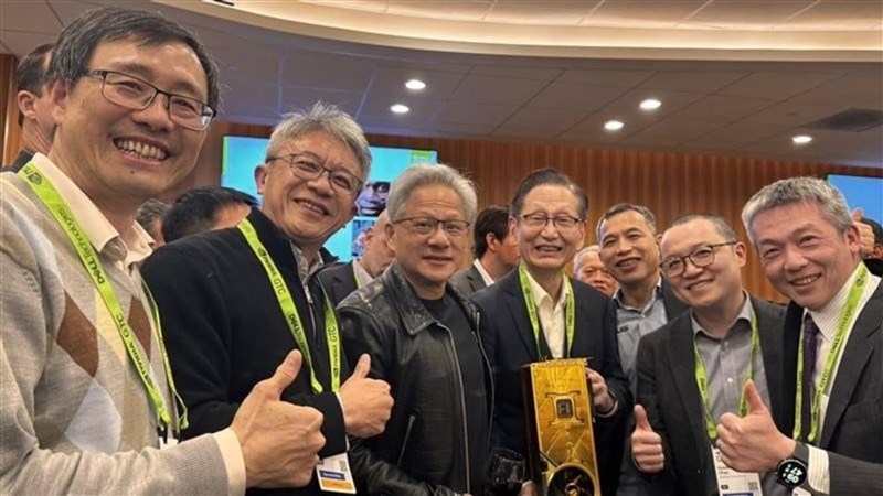 Nvidia founder and CEO Jensen Huang (third left) pose with heads of Taiwan's tech conglomerates at the 2025 GTC on Friday. Photo courtesy of Asus