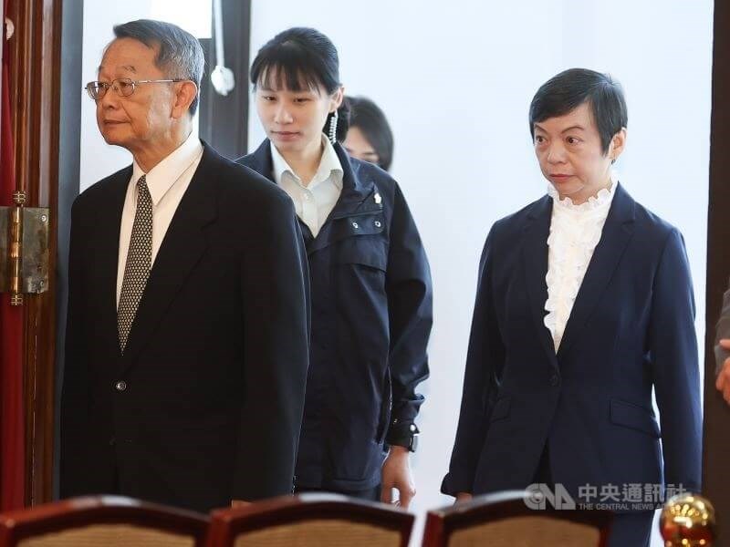 Constitutional Court nominees, Tsai Chiu-ming (first left), a head prosecutor of the Taiwan High Prosecutors Office, and Su Su-e (first right), a Supreme Court judge, enter the venue of a news conference in Taipei on Friday. CNA photo March 21, 2025