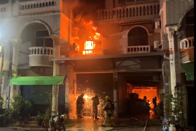 Firefighters try to put out a fire in an industrial zone in Tainan's Yongkang District early Saturday morning. Photo courtesy of a reader March 22, 2025