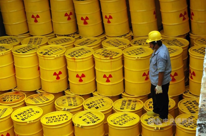 An official examines nuclear waste that has been sealed away.