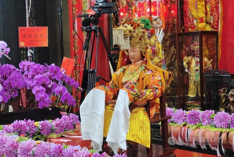 The Mazu statue selected for a 10-day procession is retrieved from her shrine to board her palanquin on Thursday. CNA photo May 1, 2025