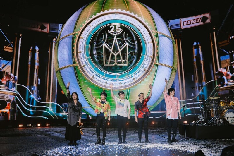 Members of Taiwanese pop rock band Mayday wave to concert attendees. Photo courtesy of B'in Music