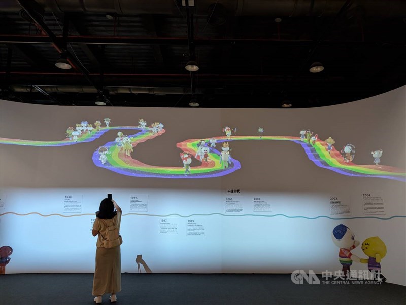 A visitor takes a picture of the "way home" section of the exhibition featuring Taiwan's gender equality milestones in this photo taken in April. CNA photo May 3, 2025