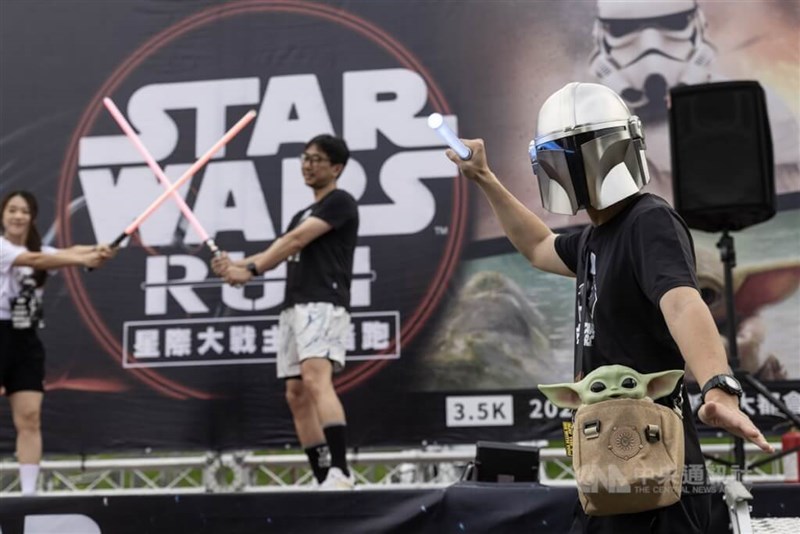 Event attendees pose for the 2025 Star Wars Run on Sunday. CNA photo May 4, 2025