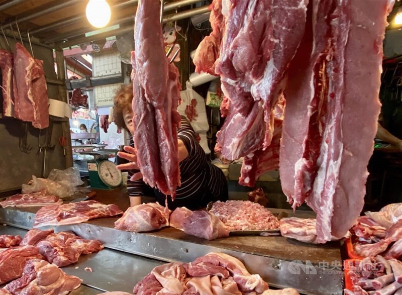 Pork from local pigs are sold at a butcher stall in this CNA file photo