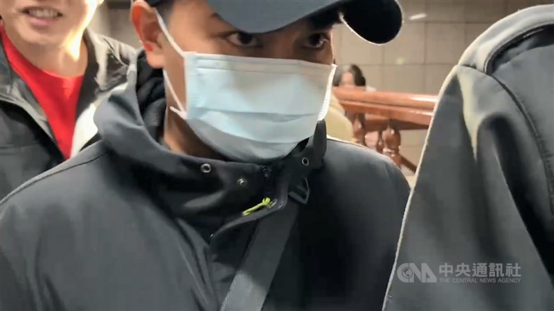 Singer Kui keeps his head down while appearing in court for the case in January this year. CNA file photo