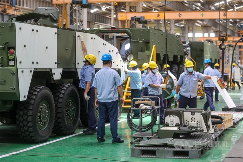 Workers man an armored vehicle production line. CNA file photo