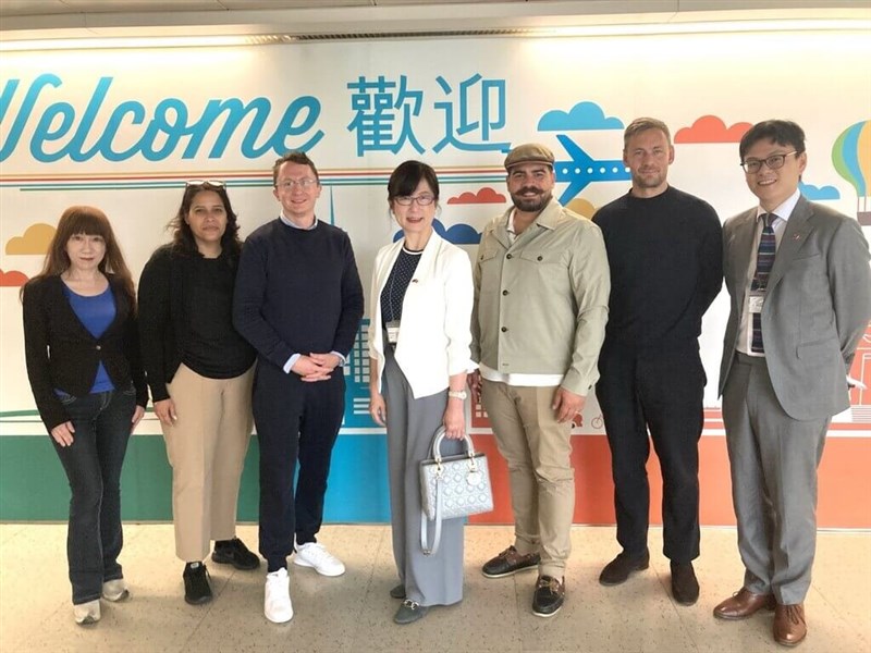 French parliamentarians Guillaume Kasbarian (3rd from right), Estelle Youssouffa (2nd from left), Paul Midy (3rd from left), and Corentin Le Fur (2nd from right) pose for a photo upon their arrival at Taiwan Taoyuan International Airport on Monday. They were accompanied by Taiwan's representative to France, Hao Pei-chih (fourth from right), on their visit to Taiwan. Photo courtesy of the Ministry of Foreign Affairs May 19, 2025