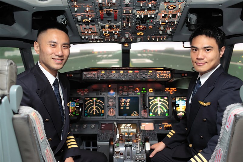 Pilots of Taiwan's flag carrier Chia Airlines pose together in the cockpit of their plane. Photo courtesy of China Airlines for illustrative purpose only