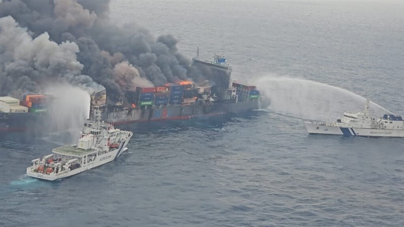 Wan Hai 503 container ship ablaze off the west coast of India. Photo taken from x.com/IndiaCoastGuard