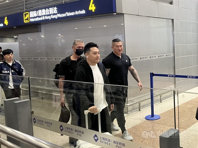 Taiwanese online celebrity Holger Chen (right) arrives in Shanghai on June 10. CNA photo June 15, 2025